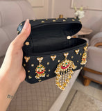 ZEWAR VANITY SLING BAGS